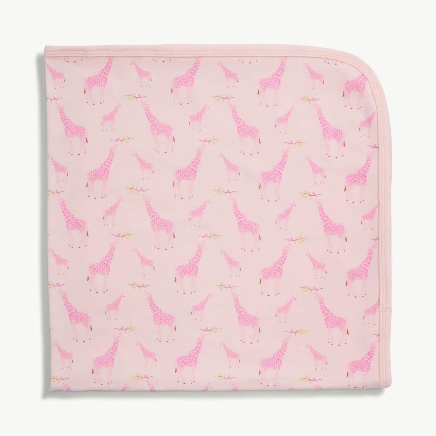 pink jolie giraffe organic cotton soothing swaddle blanket