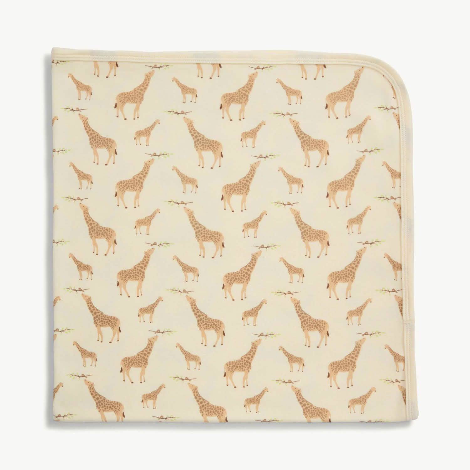 cream jolie giraffe organic cotton soothing swaddle blanket