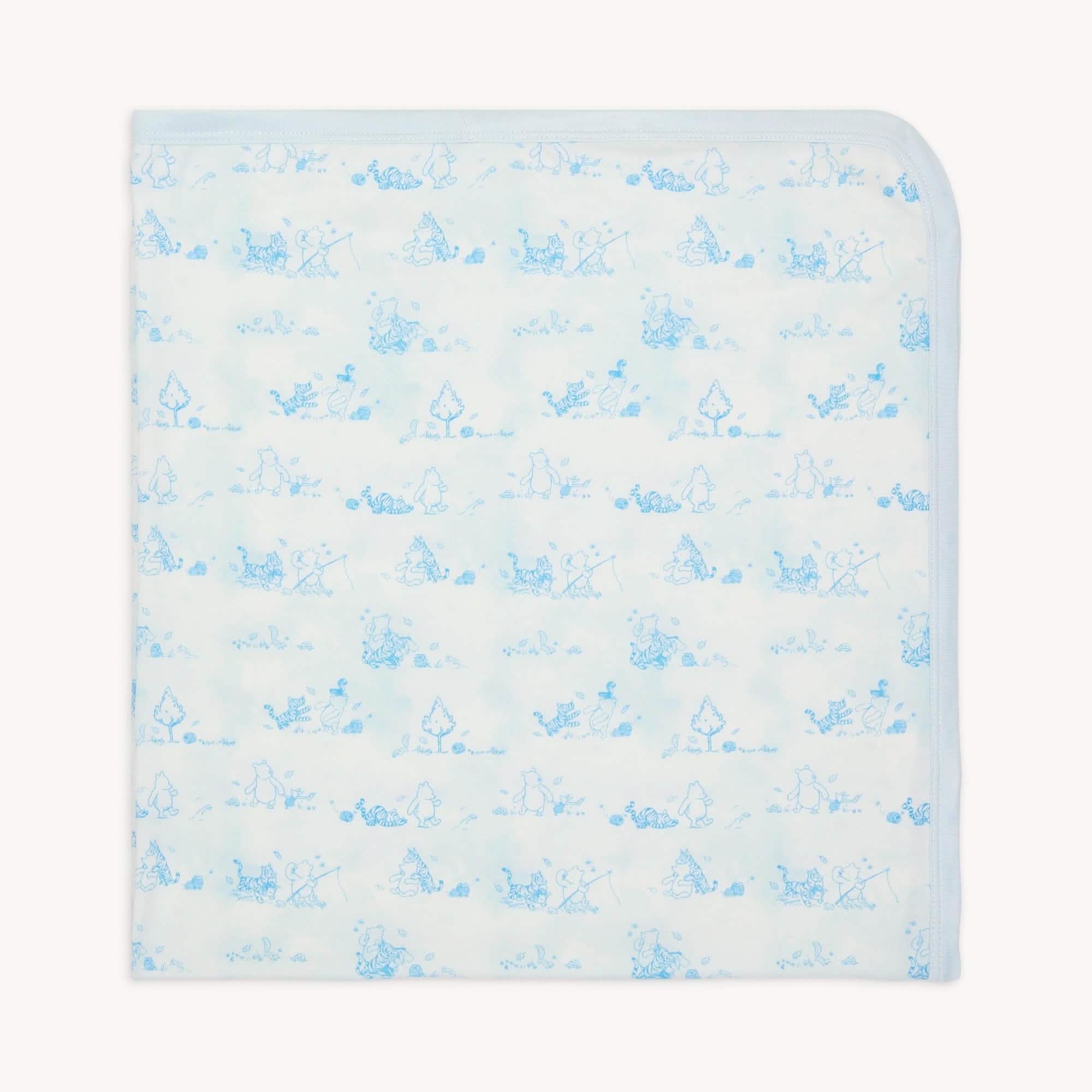 Disney | Magnetic Me Winnie the Pooh in the woods modal swaddle blanket